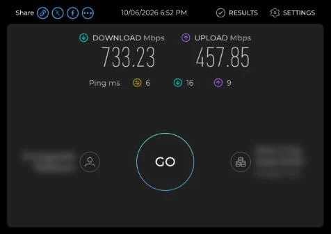 Speedtest result from a MacBook Pro over Wi-Fi showing 733.23 Mbps download, 457.85 Mbps upload and 6 ms ping
